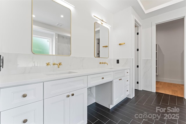 3078 Mountain Creek Dr, Sherrills Ford, NC 28673 - bathroom with double vanity, tile walls, wainscoting, wood finished floors, and recessed lighting
