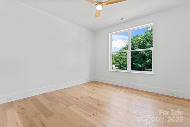 3078 Mountain Creek Dr, Sherrills Ford, NC 28673 - spare room featuring baseboards, ceiling fan, and hardwood / wood-style floors