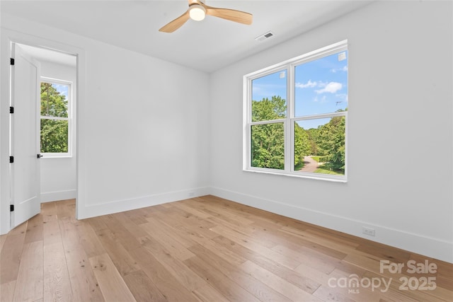 3078 Mountain Creek Dr, Sherrills Ford, NC 28673 - spare room featuring baseboards, light wood-type flooring, and a ceiling fan