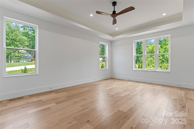 3078 Mountain Creek Dr, Sherrills Ford, NC 28673 - spare room featuring a raised ceiling, ceiling fan, light wood-type flooring, baseboards, and recessed lighting