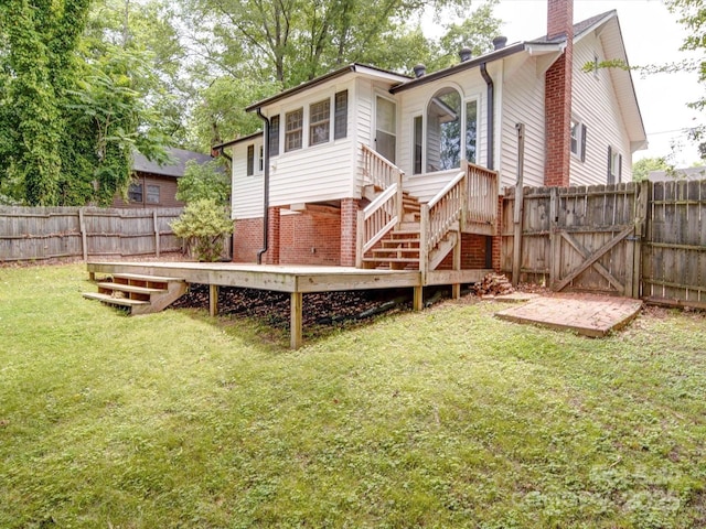318 Chestnut Ave, Kannapolis, NC 28081 - rear view of house with a chimney, brick siding, a gate, stairs, and a wooden deck