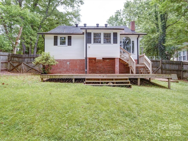 318 Chestnut Ave, Kannapolis, NC 28081 - rear view of house with a chimney, stairs, and a shingled roof