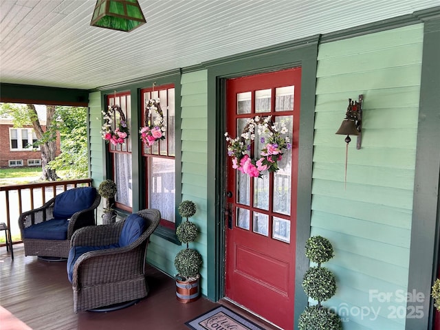 401 7th St, Spencer, NC 28159 - view of exterior entry featuring covered porch