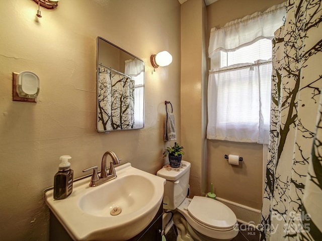 401 7th St, Spencer, NC 28159 - bathroom featuring toilet and vanity