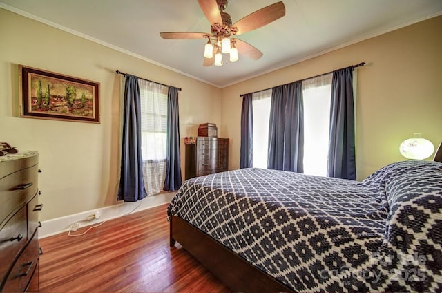 401 7th St, Spencer, NC 28159 - bedroom featuring wood finished floors, crown molding, and ceiling fan