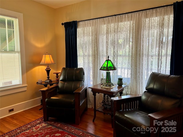 401 7th St, Spencer, NC 28159 - sitting room featuring wood finished floors and baseboards