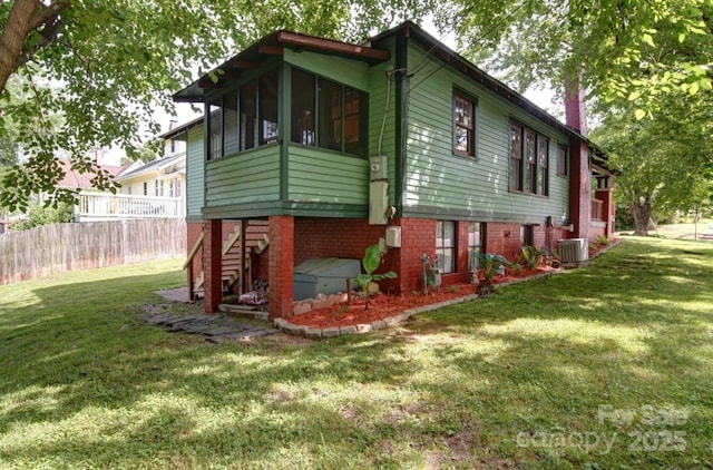 401 7th St, Spencer, NC 28159 - view of property exterior with central AC unit