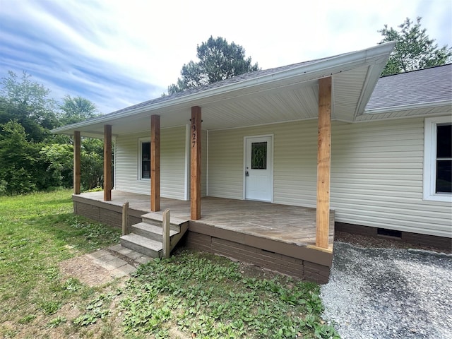 wooden deck featuring covered porch
