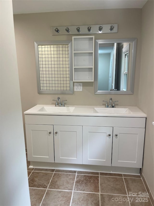full bathroom with double vanity and tile patterned flooring