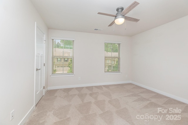 138 Lanyard Dr Unit B, Mooresville, NC 28117 - empty room with plenty of natural light, ceiling fan, and baseboards