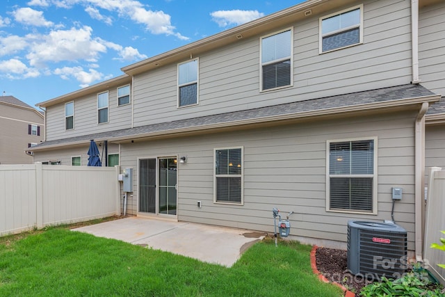 138 Lanyard Dr Unit B, Mooresville, NC 28117 - rear view of property featuring central AC unit and a patio