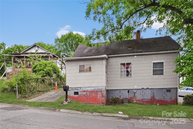 117 Young Ave SW, Concord, NC 28025 - view of side of property with a chimney and crawl space