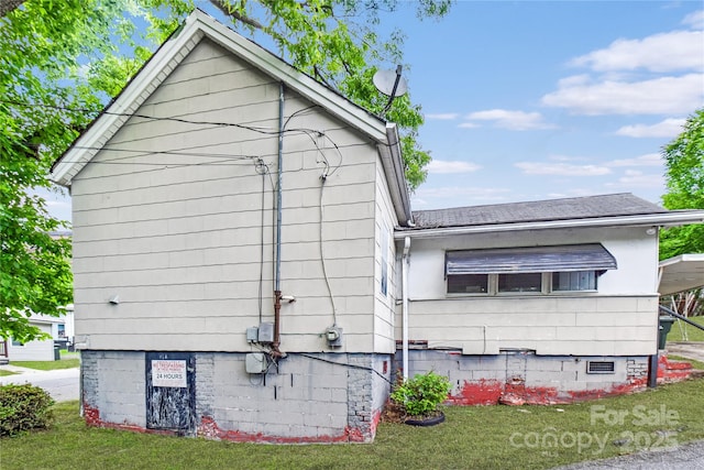 117 Young Ave SW, Concord, NC 28025 - back of property with a lawn and a shingled roof
