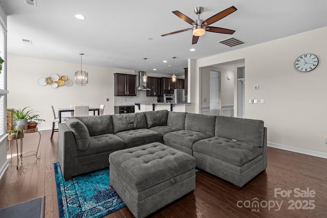 2835 Berkhamstead Cir, Concord, NC 28027 - living room with a ceiling fan, dark wood-style floors, baseboards, and recessed lighting
