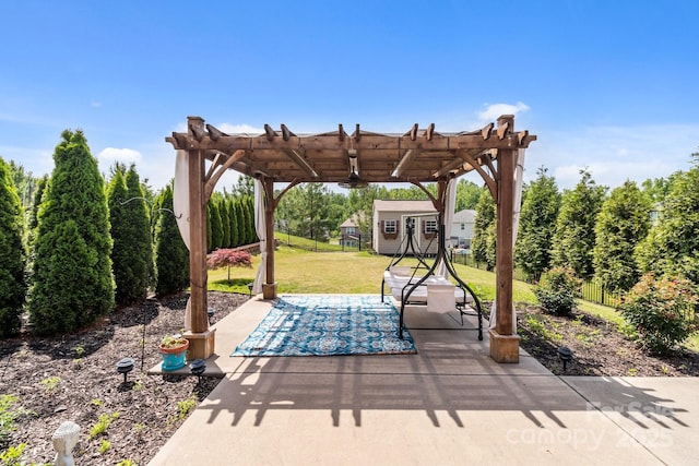2835 Berkhamstead Cir, Concord, NC 28027 - view of patio featuring a pergola and an outbuilding