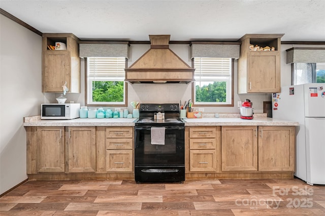 kitchen featuring white appliances, premium range hood, open shelves, light countertops, and a textured ceiling
