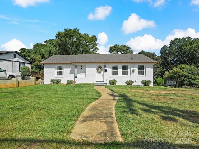view of front of house with brick siding
