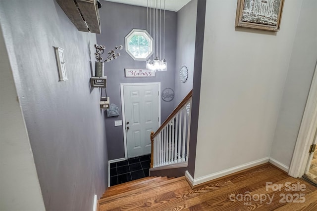 905 Severt Cir, Lenoir, NC 28645 - foyer entrance with a chandelier, wood finished floors, and baseboards