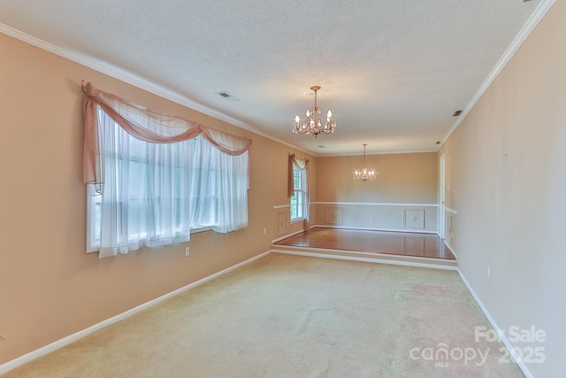 466 Shiloh Church Rd, Hickory, NC 28601 - empty room with a chandelier, ornamental molding, carpet flooring, and a textured ceiling