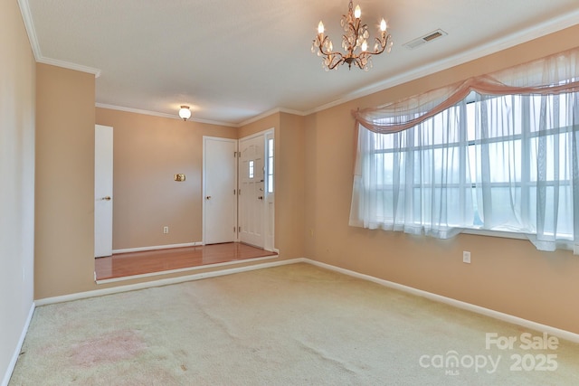 466 Shiloh Church Rd, Hickory, NC 28601 - entrance foyer with carpet floors, crown molding, and a chandelier