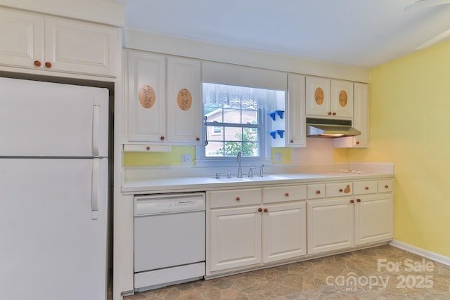 466 Shiloh Church Rd, Hickory, NC 28601 - kitchen with white appliances, under cabinet range hood, light countertops, and white cabinetry