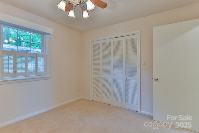 466 Shiloh Church Rd, Hickory, NC 28601 - unfurnished bedroom featuring carpet, a closet, and ceiling fan