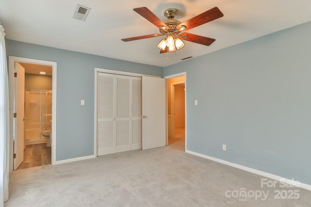 466 Shiloh Church Rd, Hickory, NC 28601 - unfurnished bedroom with carpet, a closet, ensuite bathroom, and ceiling fan