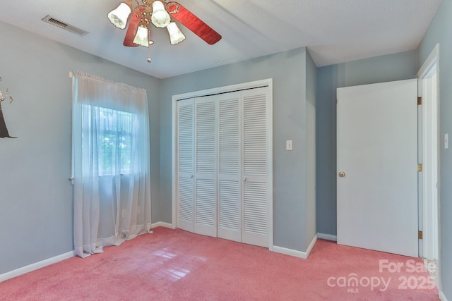 466 Shiloh Church Rd, Hickory, NC 28601 - unfurnished bedroom with light colored carpet, a closet, and a ceiling fan