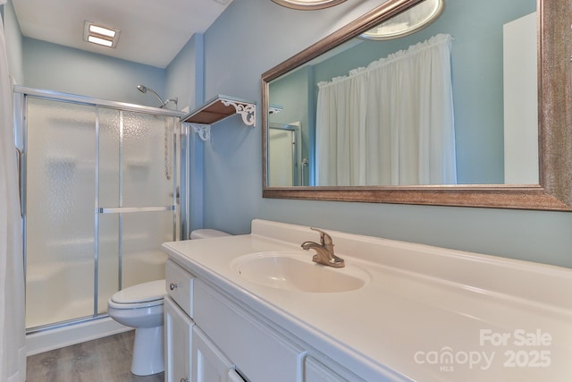 466 Shiloh Church Rd, Hickory, NC 28601 - bathroom featuring a shower stall, vanity, and wood finished floors