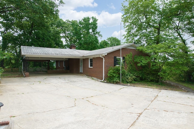 466 Shiloh Church Rd, Hickory, NC 28601 - ranch-style house with an attached carport, driveway, a chimney, brick siding, and a metal roof