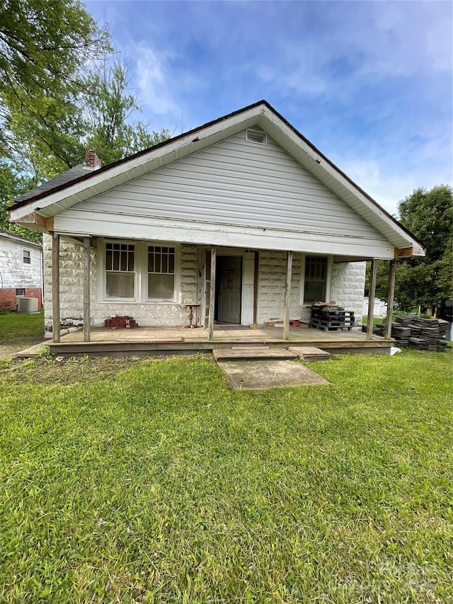 836 Mccreary St, Winston Salem, NC 27105 - view of front of house featuring a front lawn, a porch, and stone siding