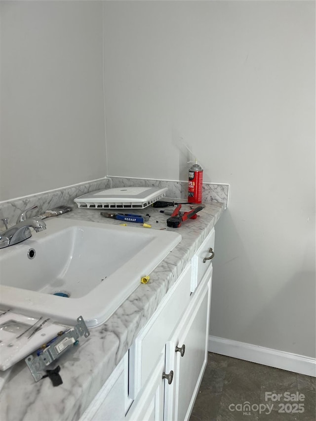 836 Mccreary St, Winston Salem, NC 27105 - bathroom with baseboards and vanity