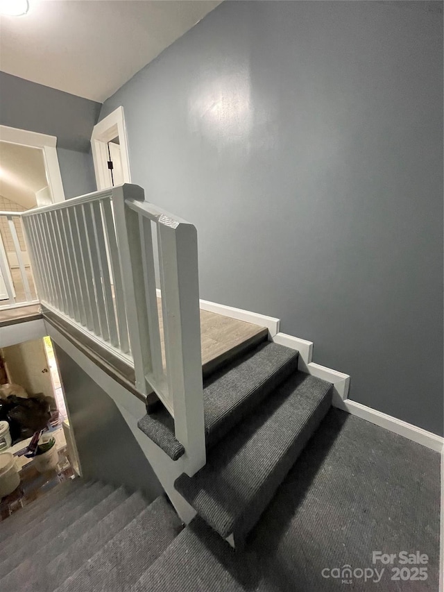 836 Mccreary St, Winston Salem, NC 27105 - staircase featuring carpet floors and baseboards