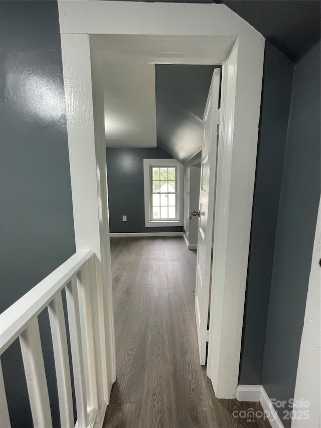 836 Mccreary St, Winston Salem, NC 27105 - hallway featuring lofted ceiling, wood finished floors, and baseboards