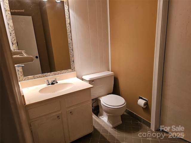 7608 Surreywood Pl, Charlotte, NC 28270 - bathroom with toilet, vanity, and tile patterned flooring