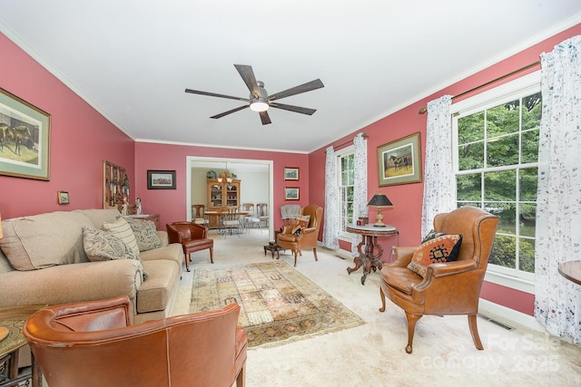 4630 Woodleaf Rd, Salisbury, NC 28147 - carpeted living area with crown molding, a ceiling fan, plenty of natural light, and baseboards