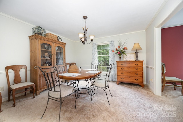 4630 Woodleaf Rd, Salisbury, NC 28147 - dining area with a chandelier, crown molding, light carpet, and baseboards