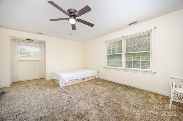 4630 Woodleaf Rd, Salisbury, NC 28147 - unfurnished bedroom featuring carpet, baseboards, and ceiling fan
