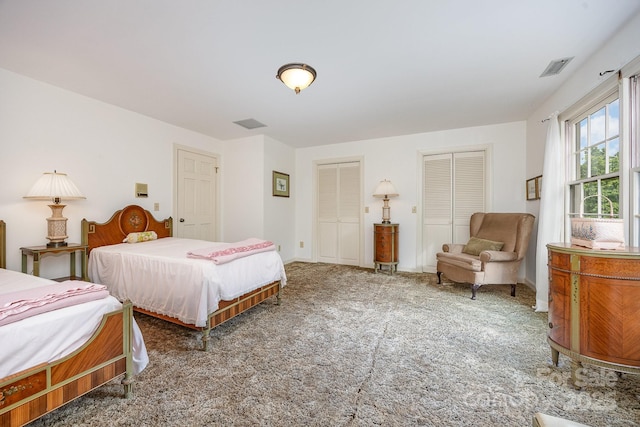 4630 Woodleaf Rd, Salisbury, NC 28147 - bedroom with multiple closets, carpet flooring, and baseboards