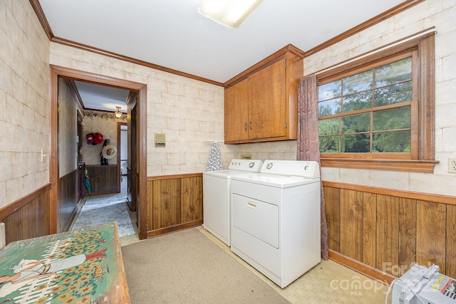 4630 Woodleaf Rd, Salisbury, NC 28147 - washroom featuring washing machine and dryer, cabinet space, ornamental molding, wainscoting, and wooden walls