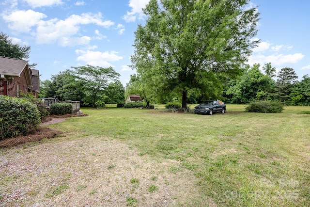 4630 Woodleaf Rd, Salisbury, NC 28147 - view of grassy yard featuring a wooden deck