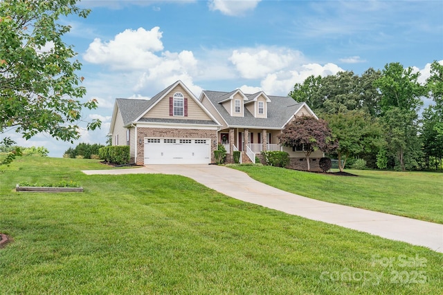 8717 Swift Rd, Oakboro, NC 28129 - view of front of property featuring concrete driveway, covered porch, a garage, a front lawn, and brick siding