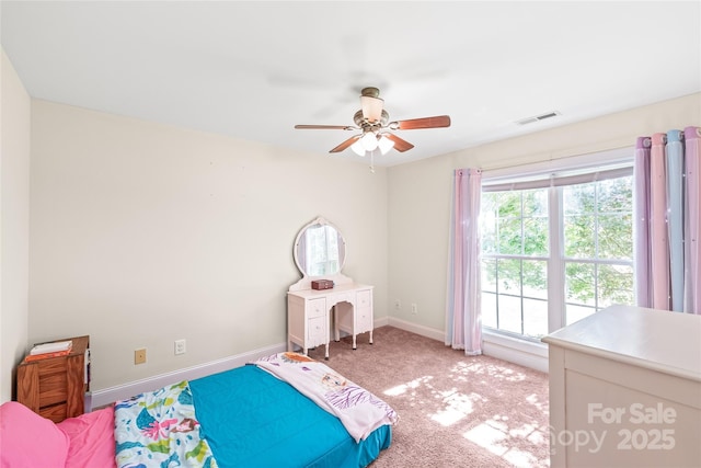 8717 Swift Rd, Oakboro, NC 28129 - carpeted bedroom with baseboards and a ceiling fan