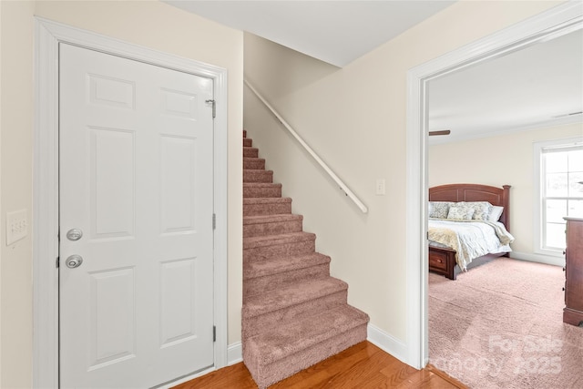 8717 Swift Rd, Oakboro, NC 28129 - staircase featuring baseboards and wood finished floors