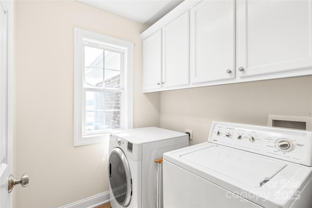 8717 Swift Rd, Oakboro, NC 28129 - washroom with washer and clothes dryer and cabinet space