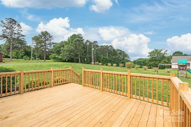 8717 Swift Rd, Oakboro, NC 28129 - deck featuring a yard and view of scattered trees