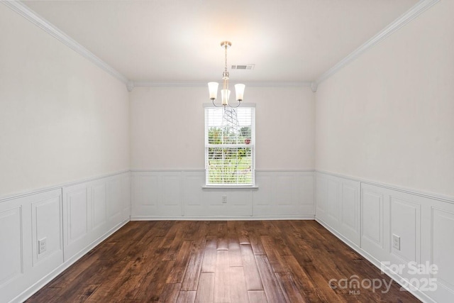 2515 Walnut Forest Dr, Charlotte, NC 28216 - empty room with a chandelier, dark wood finished floors, wainscoting, and ornamental molding