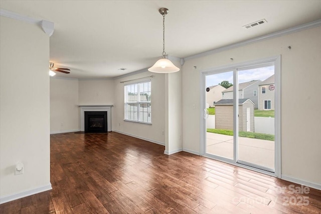 2515 Walnut Forest Dr, Charlotte, NC 28216 - unfurnished living room with wood finished floors, a fireplace, ornamental molding, baseboards, and a ceiling fan