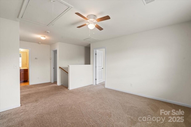 2515 Walnut Forest Dr, Charlotte, NC 28216 - spare room with attic access, light colored carpet, and baseboards