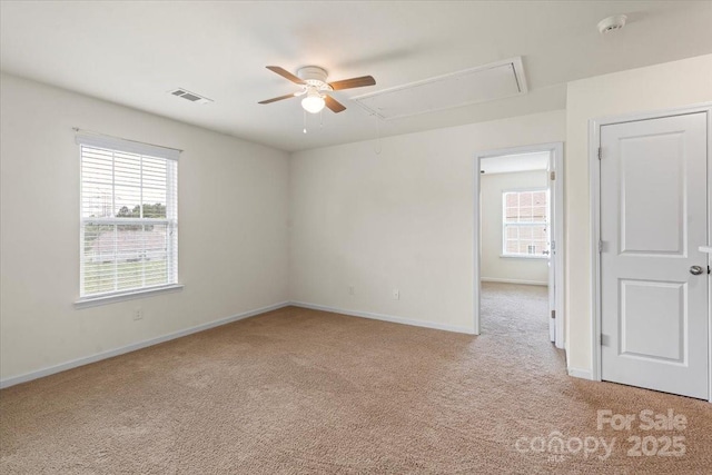 2515 Walnut Forest Dr, Charlotte, NC 28216 - empty room with attic access, carpet floors, ceiling fan, and baseboards
